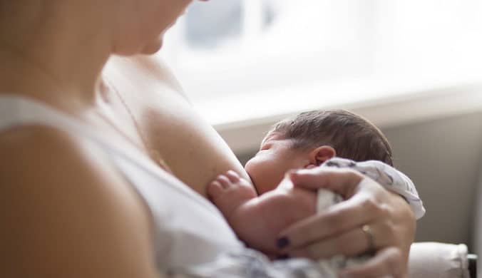 mom and baby during national breastfeeding month