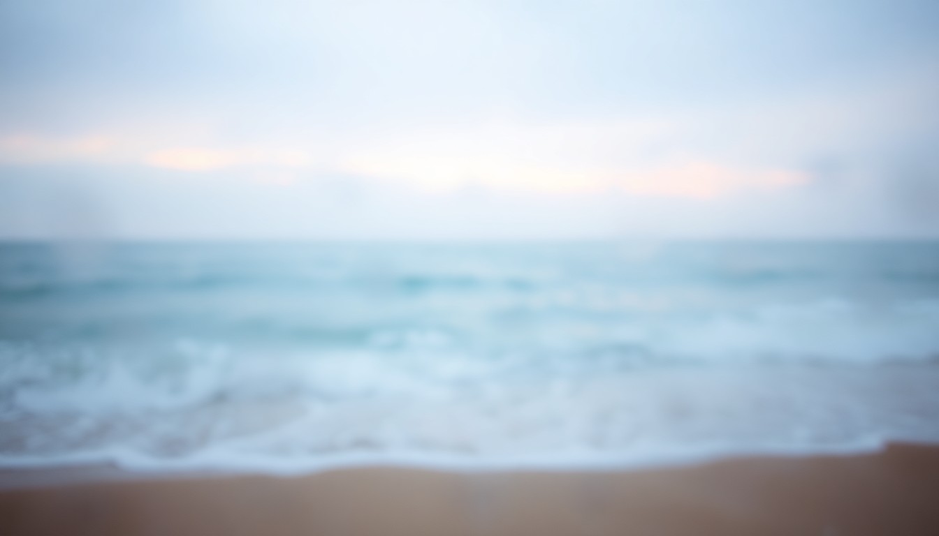 An impressionistic, out-of-focus photograph of ocean waves gently rolling onto a sandy beach, captured in soft, warm hues and blurred textures that evoke a sense of tranquility and environmental stewardship.