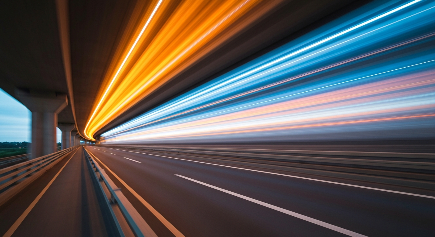 An abstract, blurred image of a car speeding on a highway overpass, with streaks of bright orange, yellow, and blue colors conveying a sense of high-speed motion and disruption.