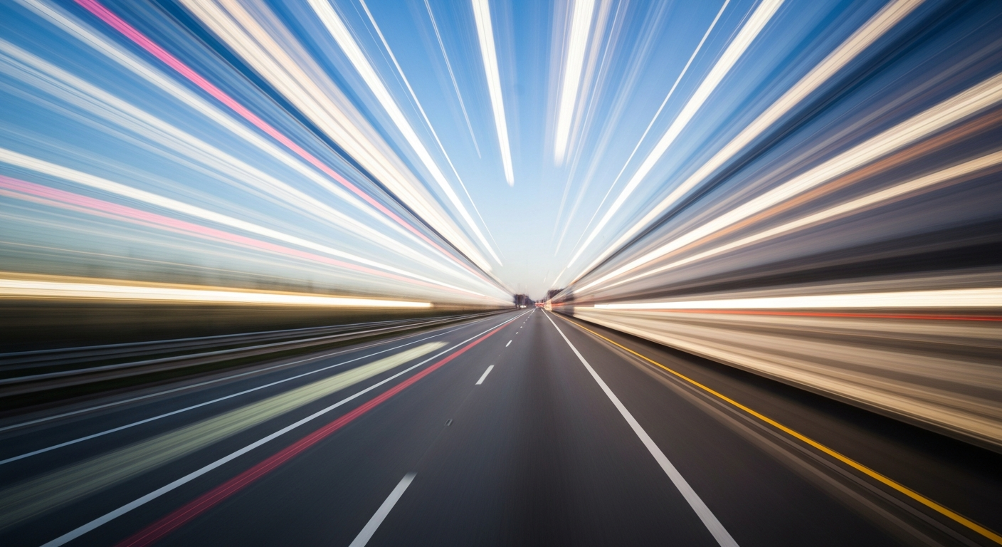 An abstract, blurred image of a vehicle speeding down a highway, conveying a sense of modern motion and engineering through the use of vibrant, sweeping brushstrokes of color.