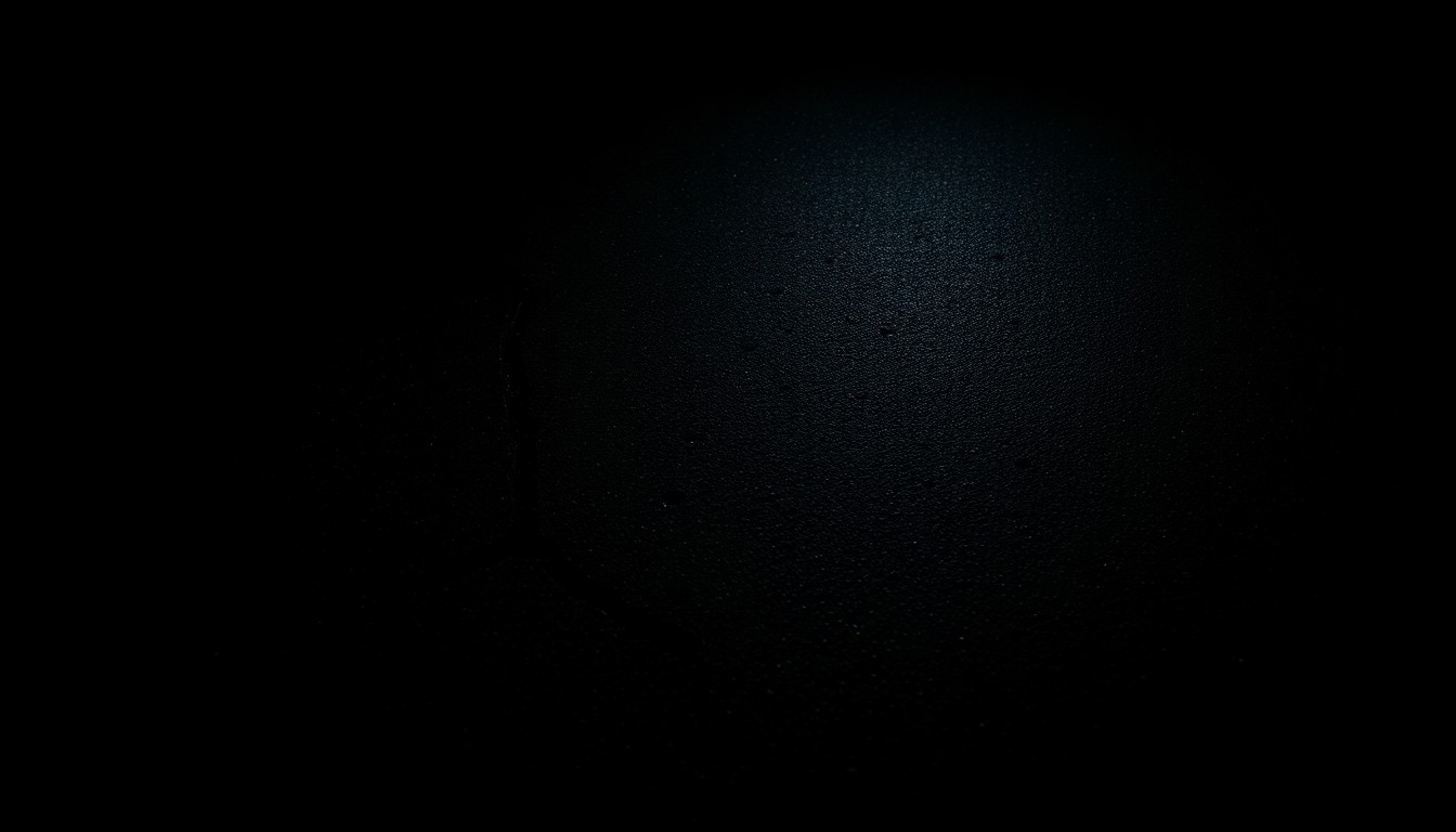 An extreme close-up of a cracked and uneven concrete sidewalk, lit by a harsh, direct camera flash against a pitch-black background, conceptually illustrating the dangerous conditions that can lead to slip and fall accidents.