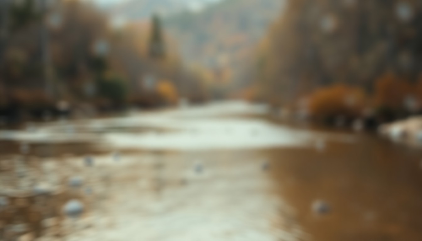An abstract, impressionistic photograph of the Arkansas River, with the water and surrounding landscape blurred into soft, warm hues of green, brown, and blue, conveying a sense of tranquility and natural beauty.