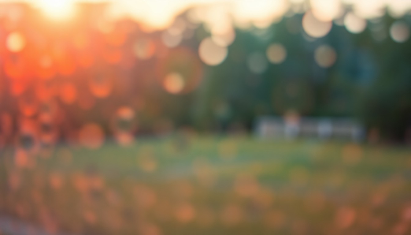 An extremely blurred, impressionistic photograph featuring soft, warm pools of light and color, evoking a sense of peaceful natural scenery that reflects the outdoor passions of the late Samuel Paul Ellis.