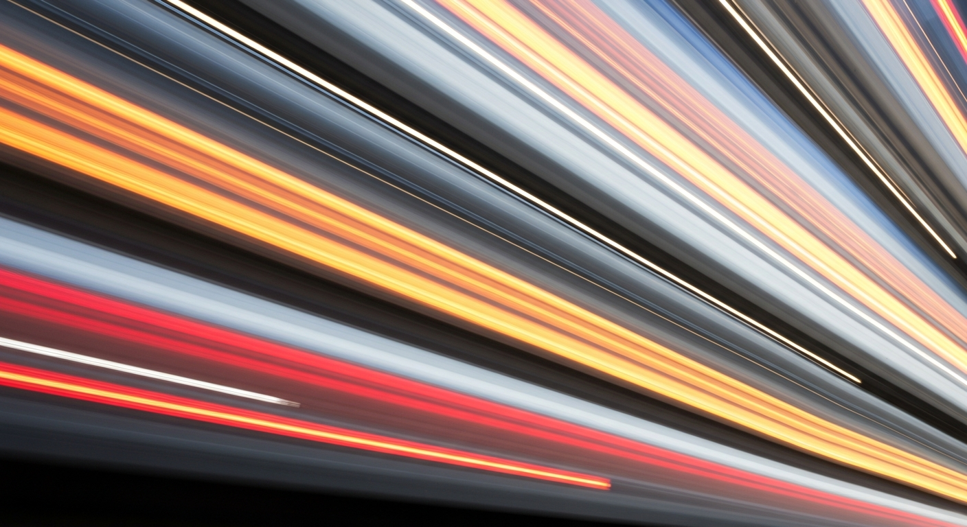 An abstract, colorful image of a moving vehicle, with the car body blurred into sweeping streaks of vibrant hues, conveying the high-speed, dynamic nature of driving in Colorado's challenging terrain.