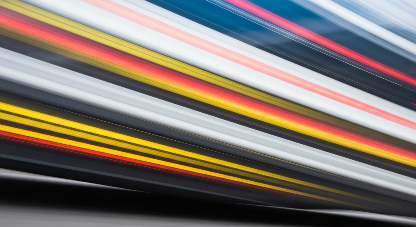 An abstract, colorful image of a moving vehicle captured with a slow shutter speed, creating sweeping, blurred lines that convey a sense of speed and chaos, conceptually representing the dangers of distracted driving.