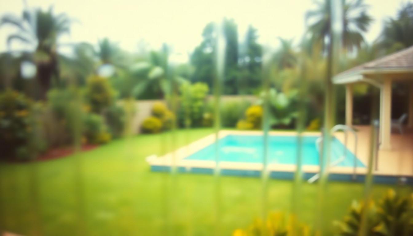 An extremely abstracted, out-of-focus photograph of a backyard with a swimming pool, captured through a rain-streaked window in soft, warm tones, conceptually representing the serene outdoor living space of the Hanover home.