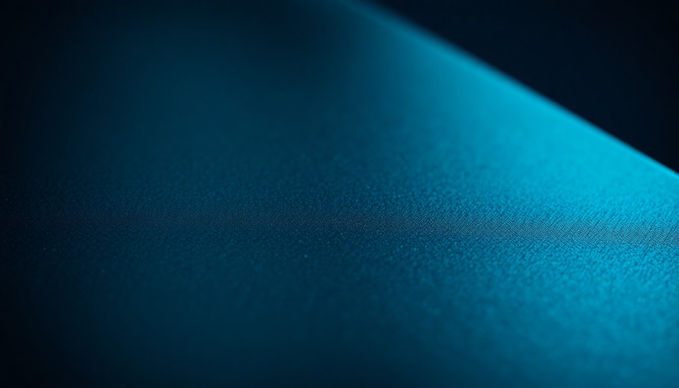 An extreme close-up of a luxurious, high-contrast texture related to the publishing industry, such as the glossy cover of a bestselling book or the metallic foil of an award statuette, conceptually representing the complexities and challenges faced by authors who maintain a double life.