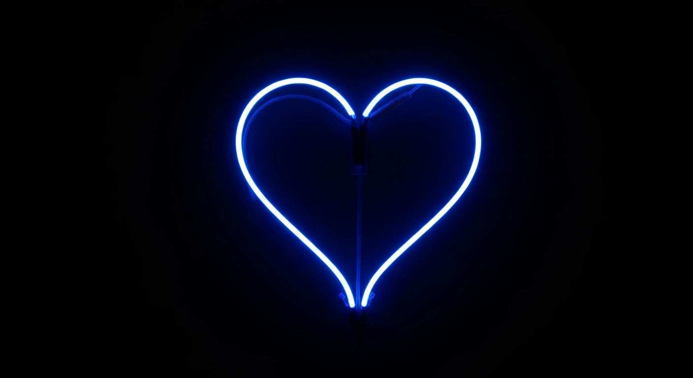 A vibrant neon outline of a human heart glowing against a dark background, conceptually representing the energy and dynamism of the new cholesterol guidelines focused on preventative heart health.