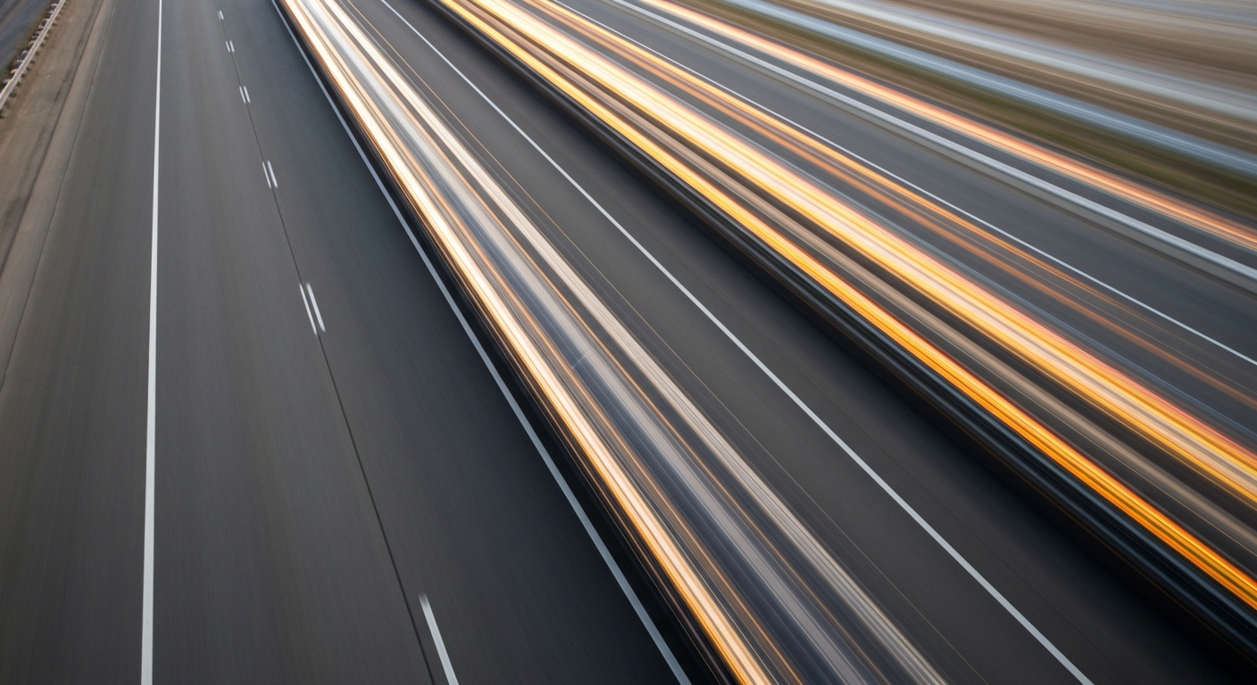 An abstract, blurred image of a vehicle moving rapidly on a highway, conveying the sense of speed and disruption caused by the interstate closure.
