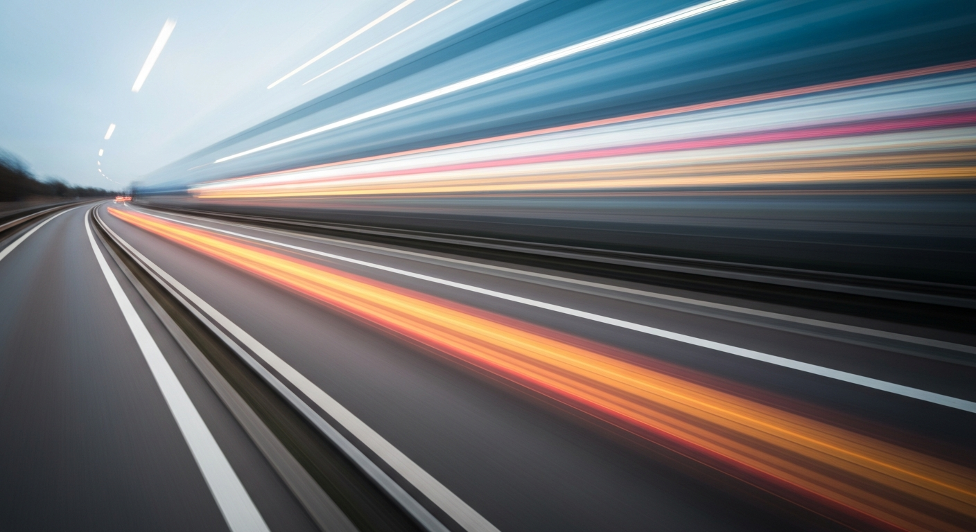 Sweeping, abstract streaks of vibrant color and motion, conceptually representing the speed and flow of modern transportation infrastructure.