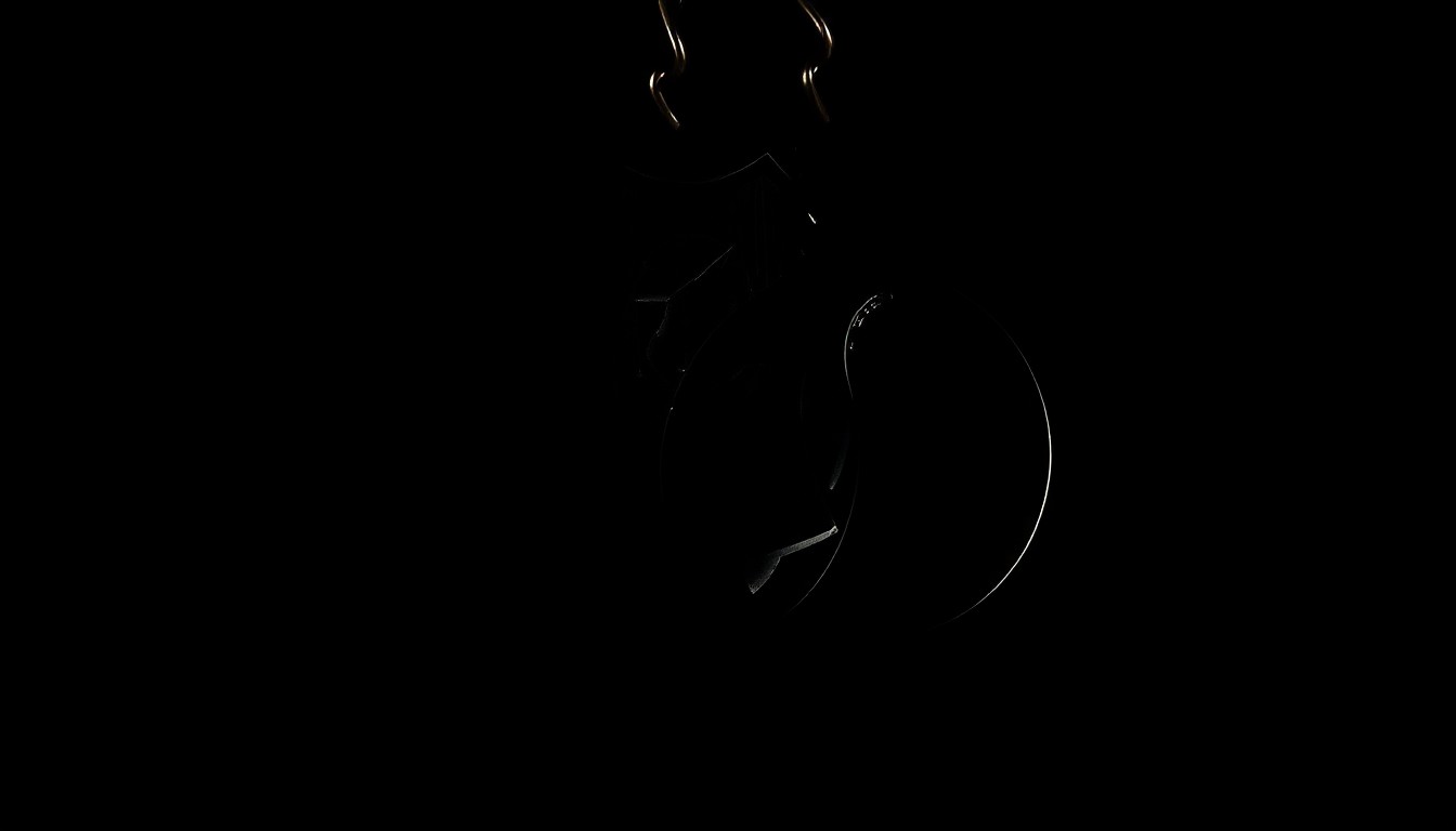 An extreme close-up photograph of a police badge or handcuffs against a pitch-black background, lit by a harsh, direct camera flash, conceptually representing the investigative resources provided by state grant funding.