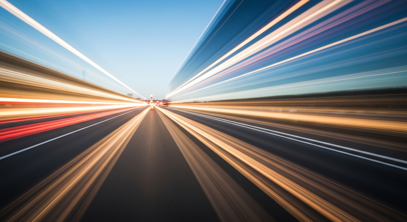 An abstract, blurred image of a car speeding through a highway work zone, conveying a sense of motion, speed, and the need for caution in active construction areas.