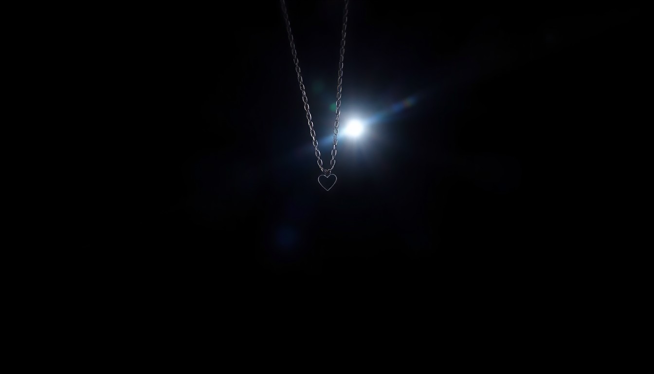 An extreme close-up photograph of a necklace with a small heart pendant, lit by a harsh, direct camera flash against a pitch-black background, creating a stark, gritty, investigative aesthetic.