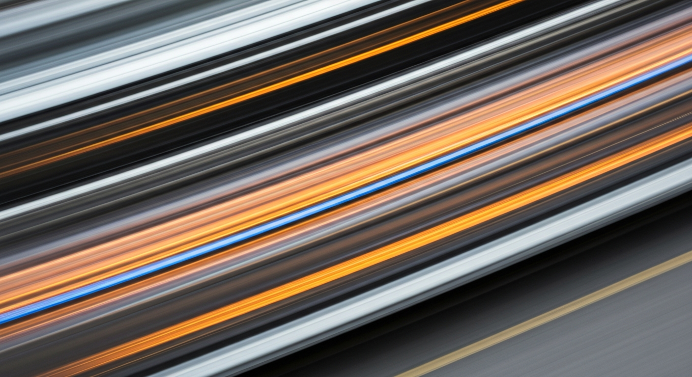 An abstract, colorful image created through slow-shutter panning, depicting a vehicle in motion as sweeping, vibrant streaks of color, conveying the energy and dynamism of the automotive industry.