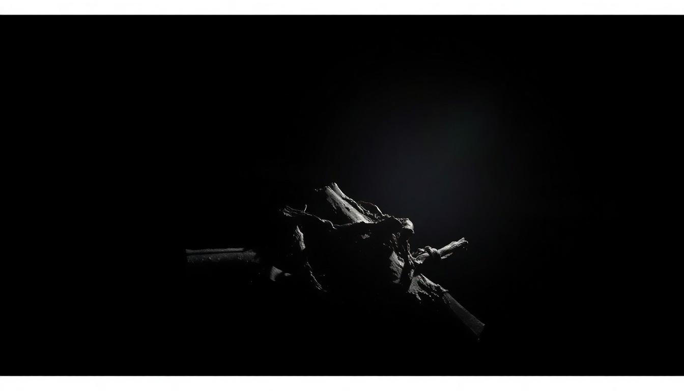 An extreme close-up photograph of a twisted, charred piece of metal debris, capturing the gritty, investigative nature of the crime scene in dramatic lighting.