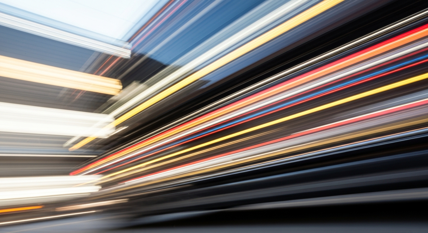 An abstract, blurred image of a car in motion, with streaks of vibrant colors representing the speed and energy of automotive repair and maintenance.
