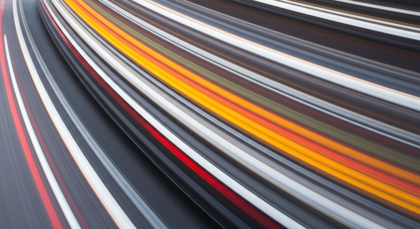 An abstract, colorful image created with a slow shutter speed and panning motion, depicting a blurred and dynamic representation of a moving vehicle, conveying the energy and challenges of the casting process.