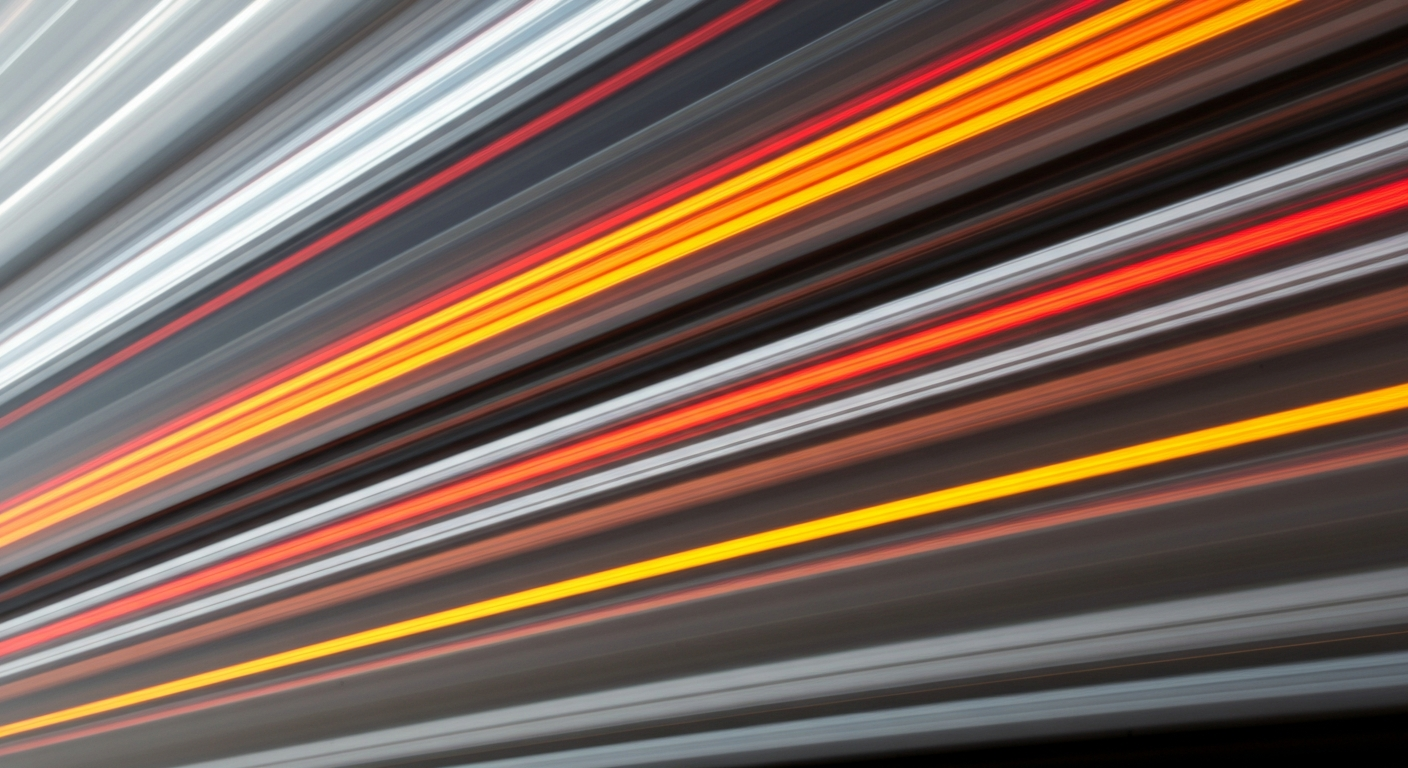 An abstract, blurred image of a moving vehicle, conveying a sense of speed, modern engineering, and the chaotic energy of the automotive industry.